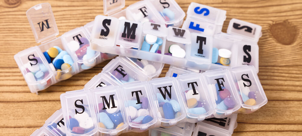 Active therapy for dementia patients can be done in conjunction with or without additional medication based on each patient's needs. (Photo shows weekly pill dispensers)