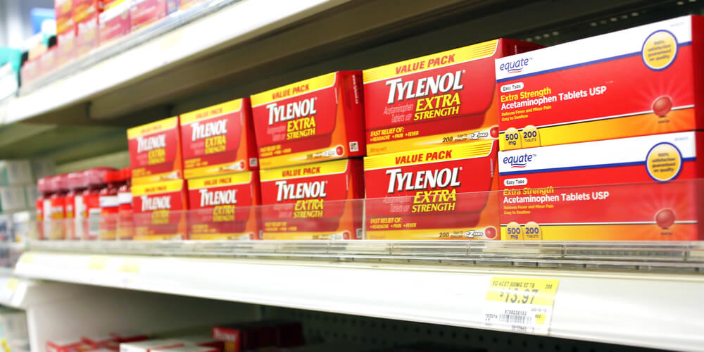 Tylenol Extra Strength Pain Medication on a pharmacy store shelf.
