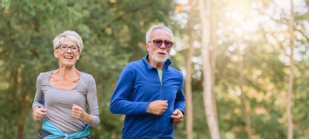 Couple running outdoors