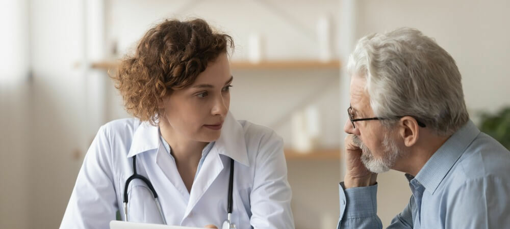 A doctor meeting with a patient.