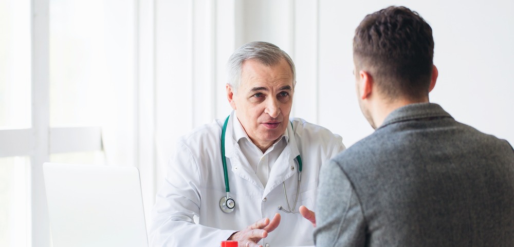 Young patient consulting a doctor. 