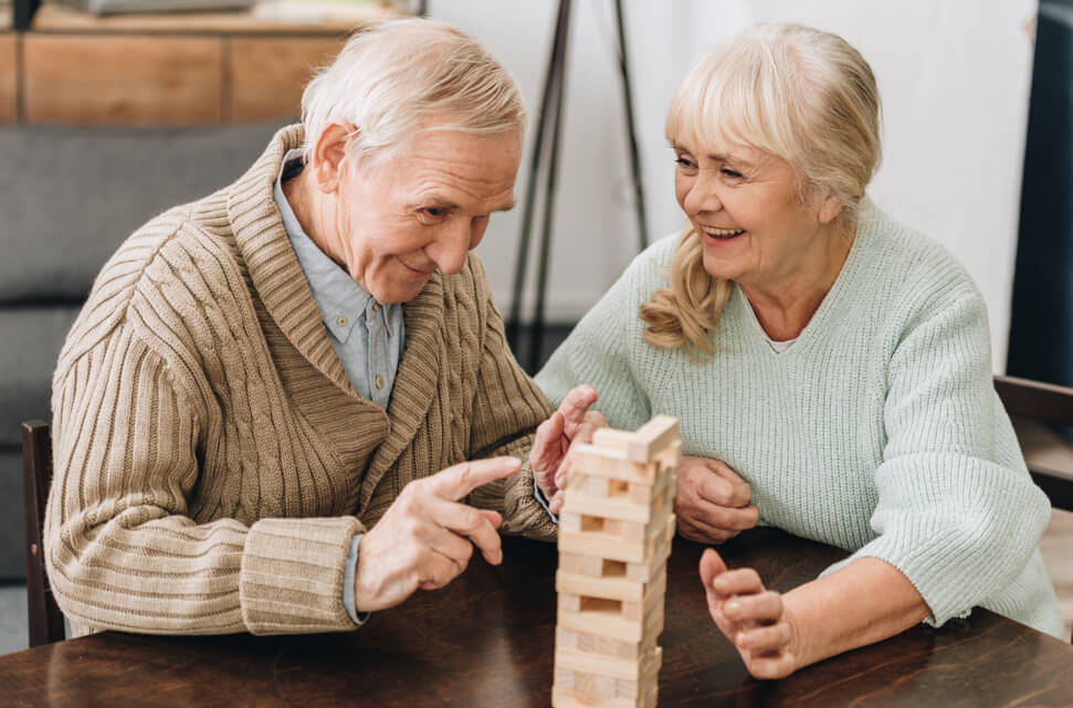 Senior couple playing Jenga