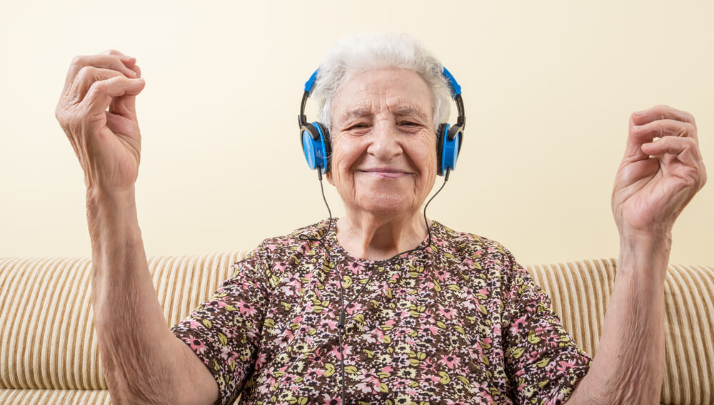 Senior woman listening to music