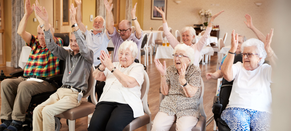 A group of seniors participate in exercise. 