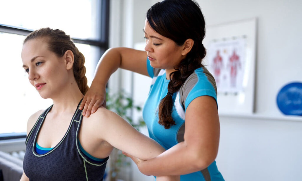 Patient with physical therapist